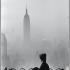 Immagine con donna ed Empire State Building sullo sfondo